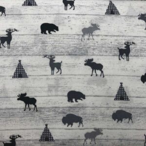 Black filled in shapes of moose, deer, and bears, as well as teepees on a white rustic grey background