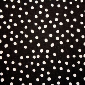 white small polka dots on a black background